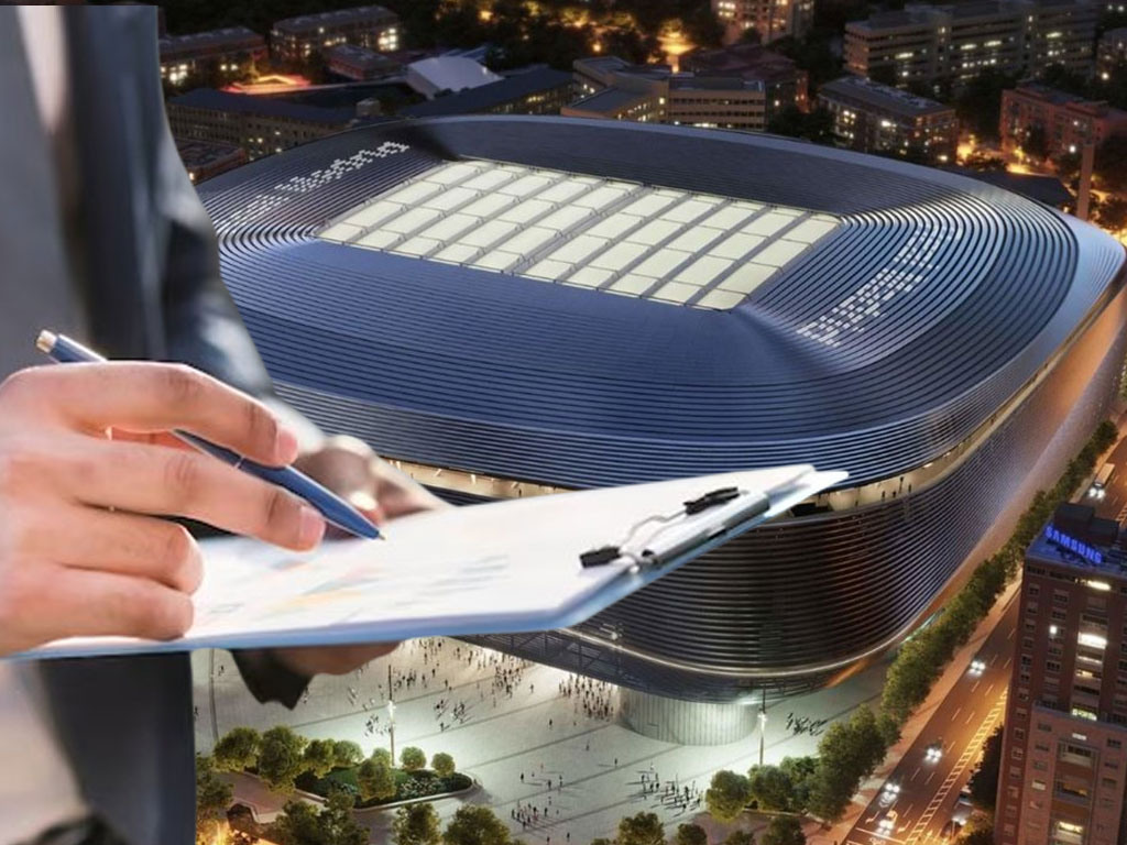 Nuevo Bernabéu y una mano apuntando